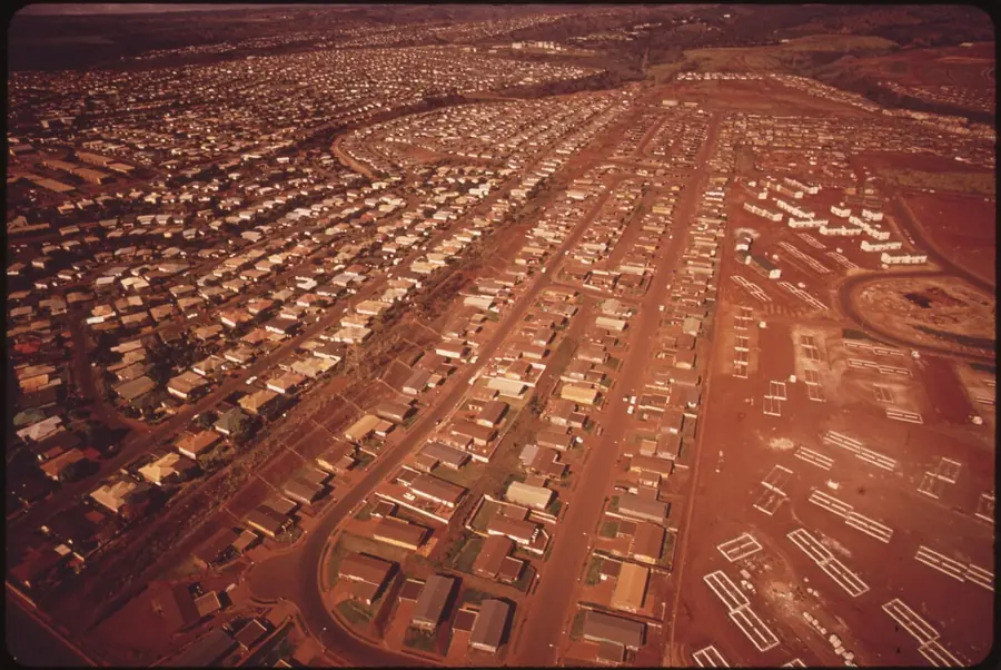 Aerial photo from the 1970s of tract houses spreading over the Pearl City slopes